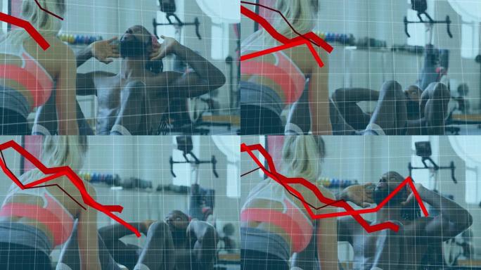 红色图表与进行仰卧起坐运动的男拳击手对抗