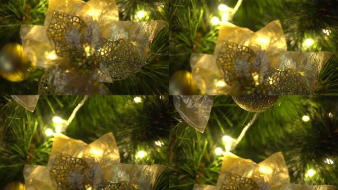 百货公司的圣诞装饰品。倾斜击球从下到上。把注意力放在圣诞树的叶子上。