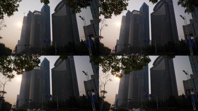 日落灯青岛市市中心摩天大楼建设交通街慢动作全景4k中国