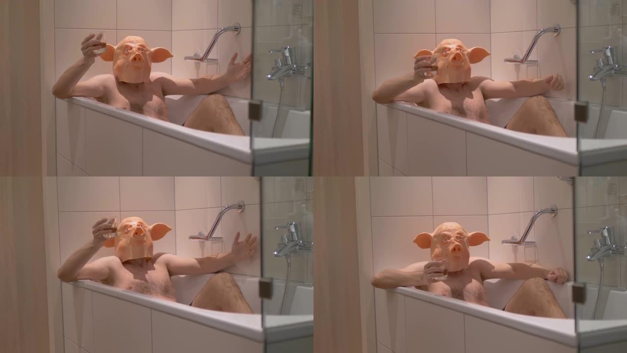 穿着猪面具的男人在4k慢动作60fps下班后在浴缸里放松，喝鸡尾酒