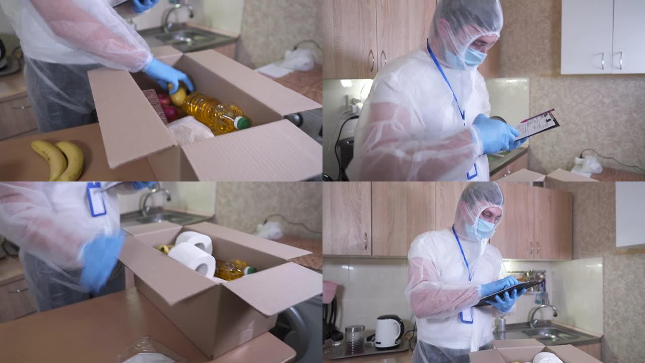 Mercy志愿者男子用手将杂货从桌子上折叠成纸板donat盒子，戴着防护手套，在冠状病毒大流行期间转
