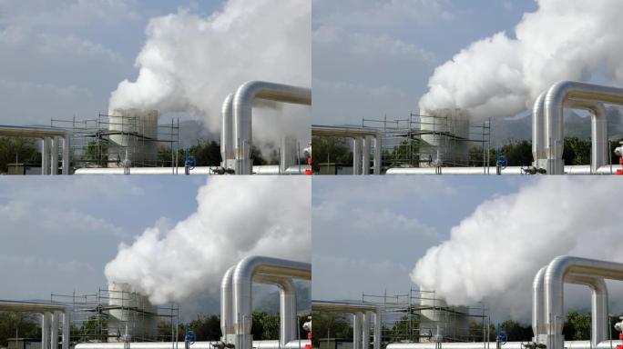 热带雨林中有蒸汽和管道的地热站。烟雾堆中滚滚的蒸汽充斥着天空，