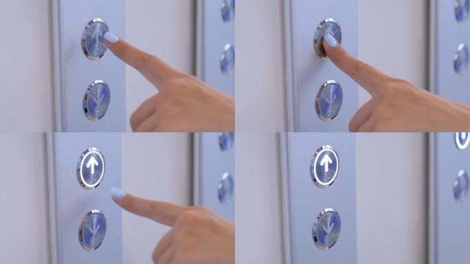 慢动作: 女人手指按电梯向上按钮-向上移动概念