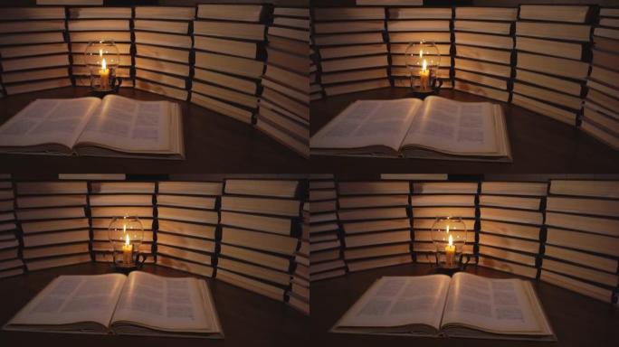 书和蜡烛在桌子上的背景旧书