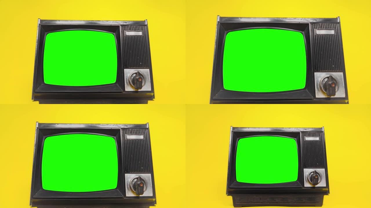 绿屏旧电视。黑白色调。快速放大。准备用您想要的任何镜头或图片替换绿色屏幕。您可以使用 “键控” (色