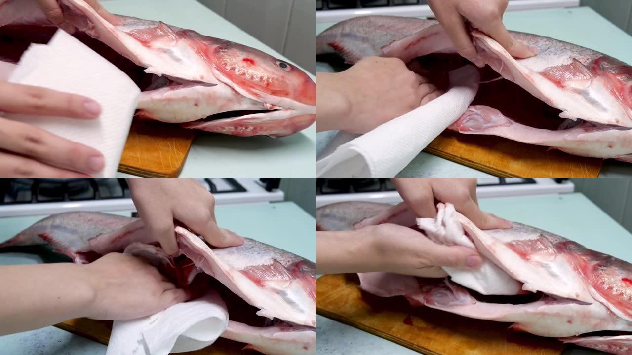 煮silver鱼。清洁肋骨并用餐巾吸干其内部