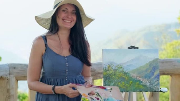 幸福的女人艺术家和她的风景图片