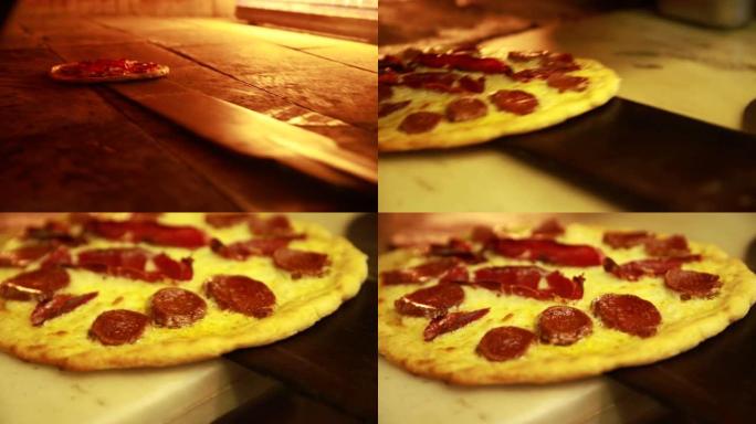 准备意大利香肠比萨饼-将比萨饼放入燃木烤箱中。意大利食物，膳食，午餐，美食，餐厅，转