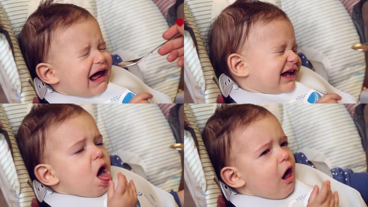 小婴儿在哭，不要吃东西或吃药