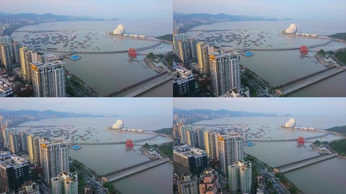 日落时间珠海城市景观交通湾港口歌剧院空中全景4k中国
