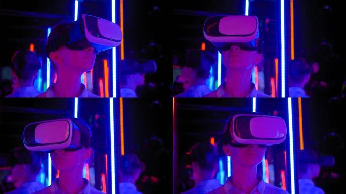慢动作: 在交互式VR展览会上使用虚拟现实耳机的女人