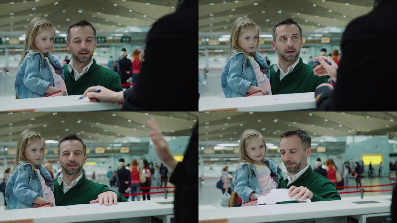 父亲手上害羞可爱的小女孩从登机处拿机票 ..机场航站楼。在红色相机上拍摄的电影。