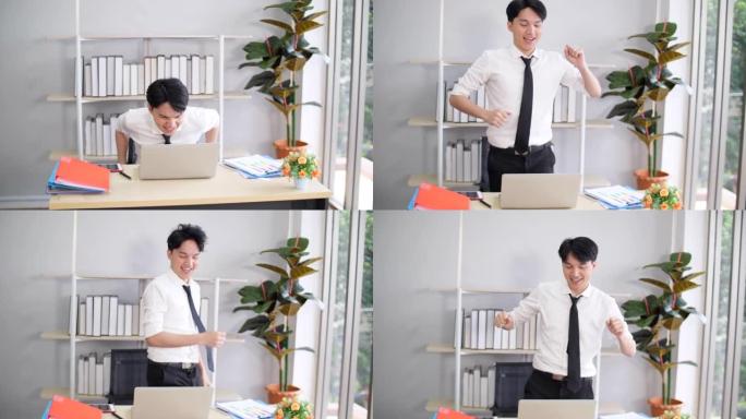 办公室里快乐的年轻商人，办公室里跳舞的年轻商人