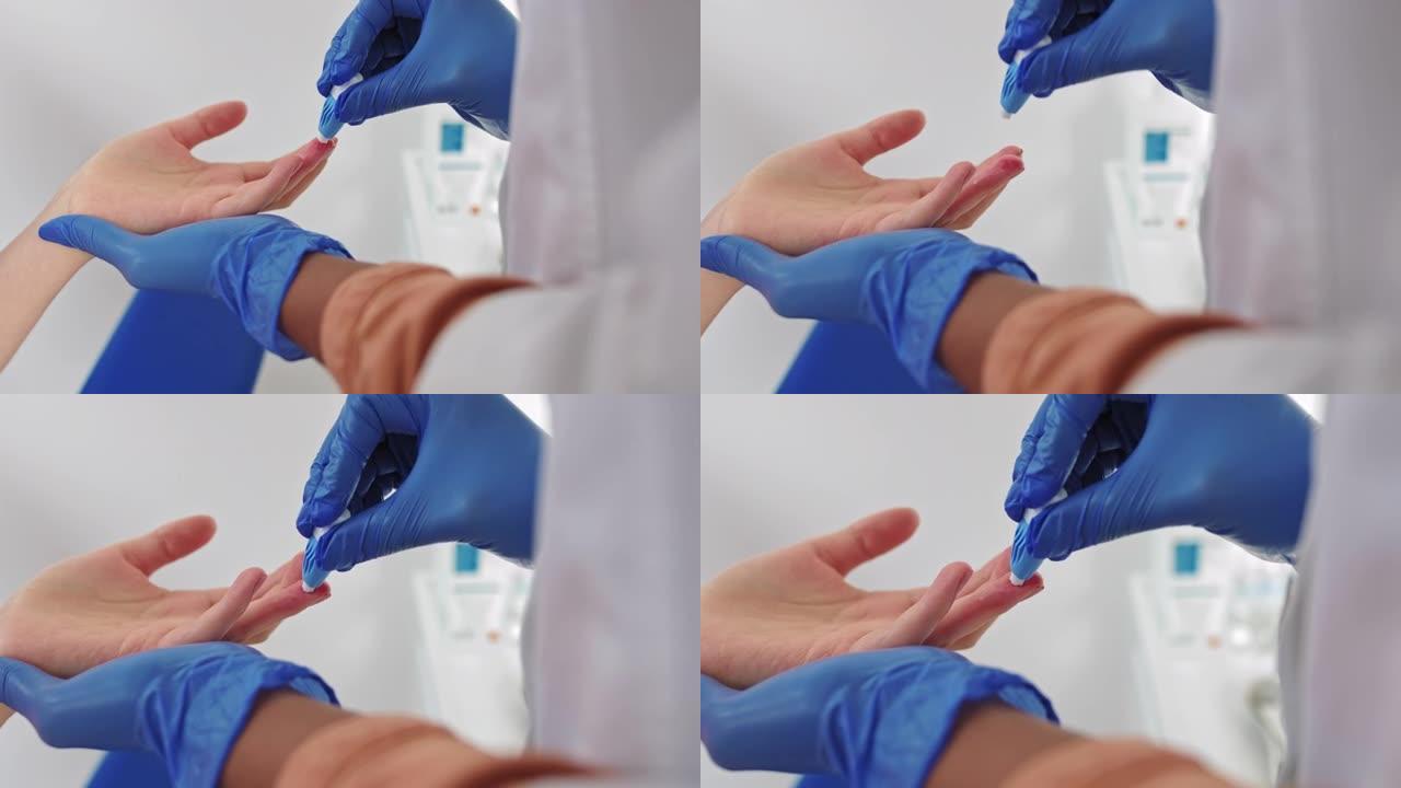 手指血液测试。手戴手套采集血样的特写镜头。血液测试的特写。护士从女性手上抽血。医学检测艾滋病毒，研究