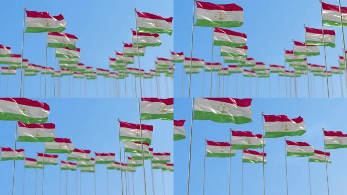 塔吉克斯坦一排带有天空背景的国旗。