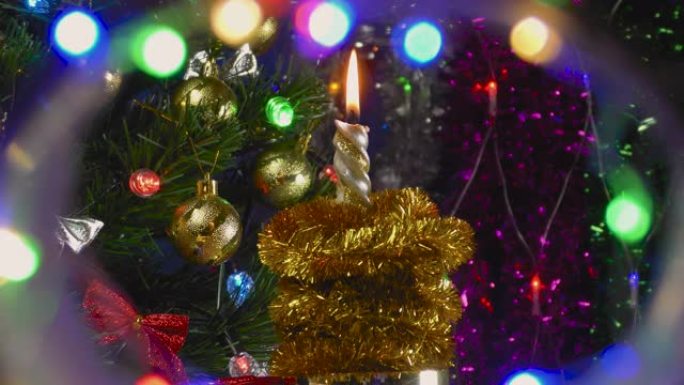 圣诞节燃烧蜡烛的背景是新奇的装饰品