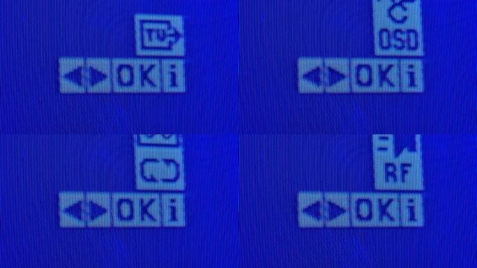 旧模拟电视屏幕的微距拍摄。模拟复古电视设置菜单在极端特写。蓝色像素背景。复古电视