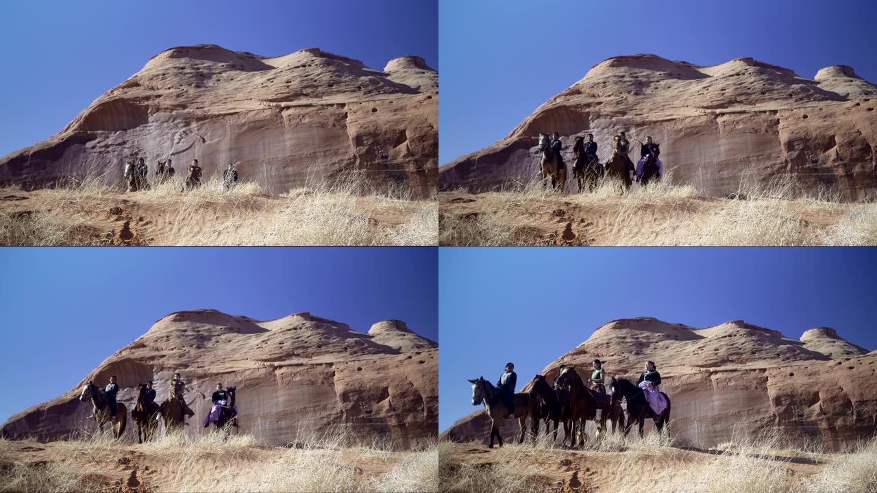 北美印第安人在美国亚利桑那州纪念碑谷骑马