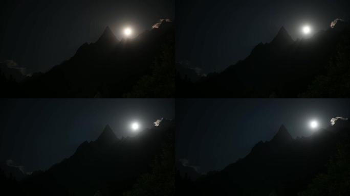 山里的风景。月亮在夜空中的延时视频。