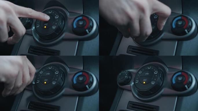手动按下汽车空调风扇的仪表板按钮和旋转旋钮，用于慢速和进气设置