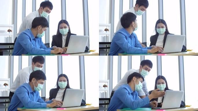 新常态在办公室工作，年轻人使用防护口罩