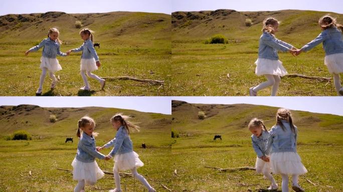 在群山的背景下，两个双胞胎姐妹在田野上手牵手旋转。