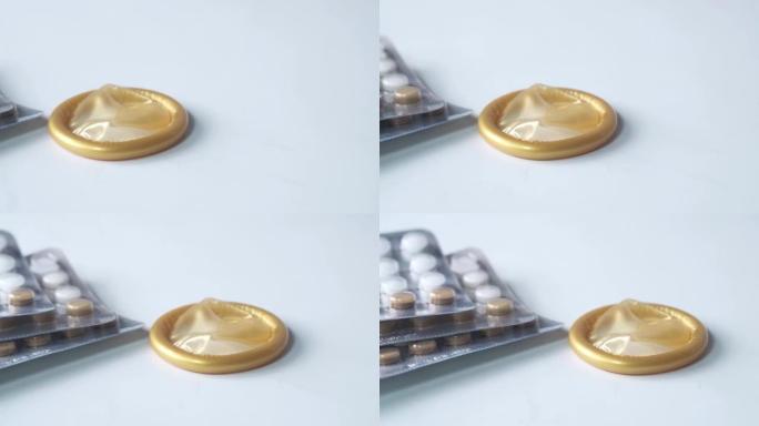 白色避孕套和避孕药的特写