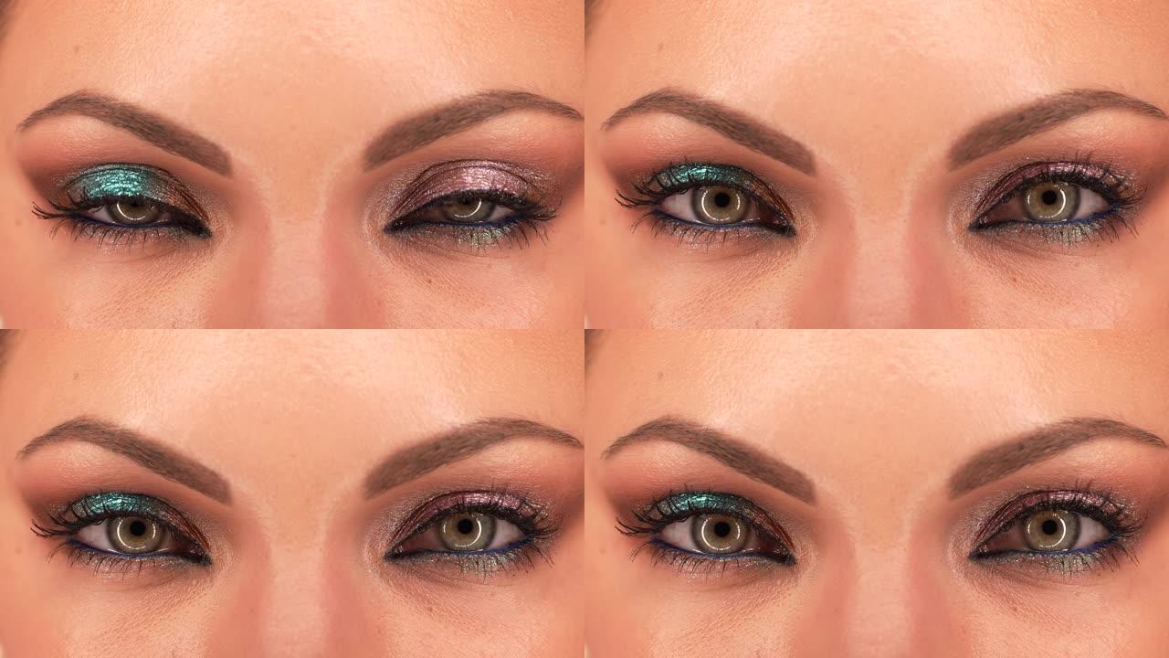仅限女性眼睛。女人有不同的美丽化妆，绿色和粉红色的闪光阴影。女孩用绿色的眼睛眨眼，收缩。美容，化妆品