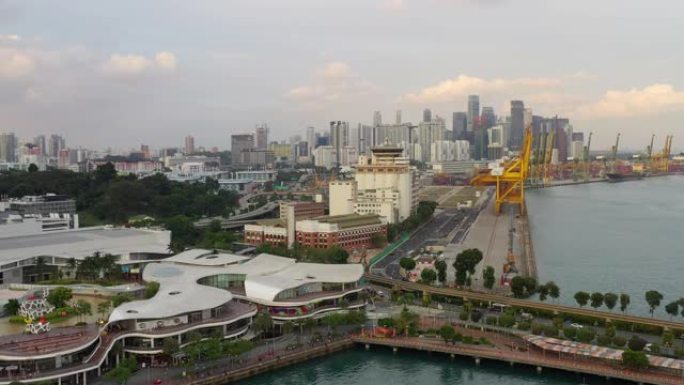 日落天空新加坡城市著名的圣淘沙岛购物中心市中心交通湾景观空中全景4k