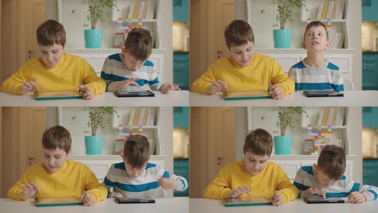 两个患有自闭症的男孩使用平板电脑进行教育应用。自闭症谱系障碍在线教育。家庭数字教育。