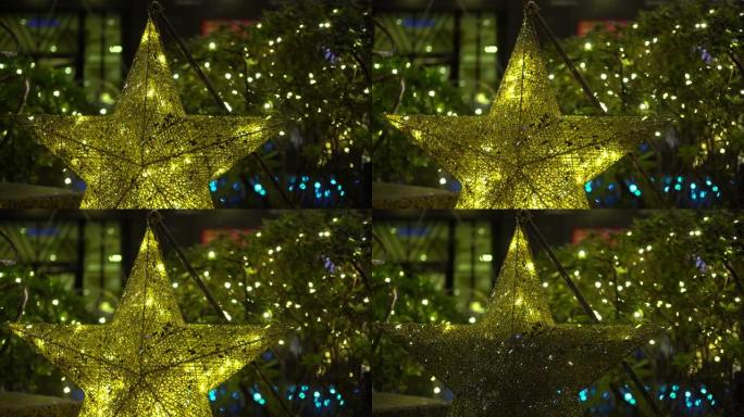 百货公司或教堂的圣诞装饰品。近距离观察星形光。主题在左边。