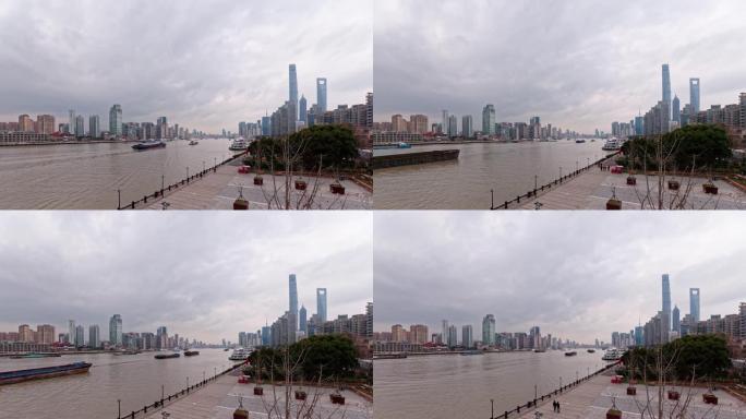 美丽的上海城市景观，多云的天空背景，在黄浦江上航行的货船，4k镜头，延时视频，b滚动镜头。