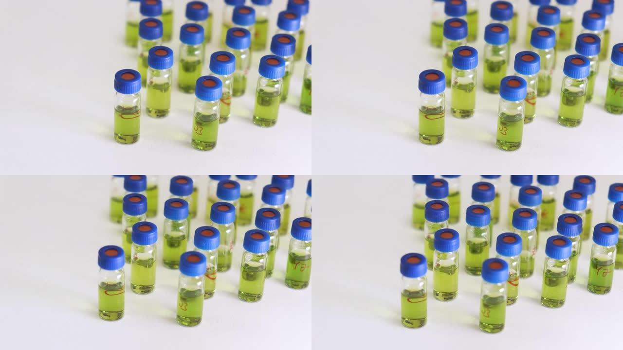 在HPLC分析之前，玻璃小瓶或带有绿色植物提取物的瓶子。代谢组学分析。