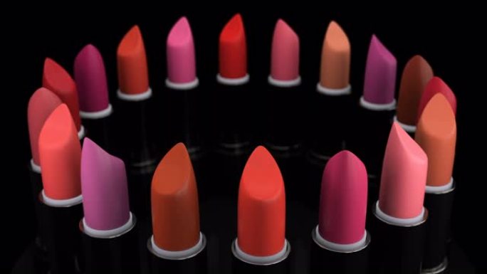 女性和造型师的红色和化妆品系列唇膏