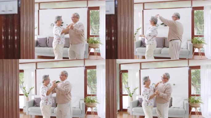 亚洲老年夫妇喜欢在家跳舞放松，老年退休生活理念