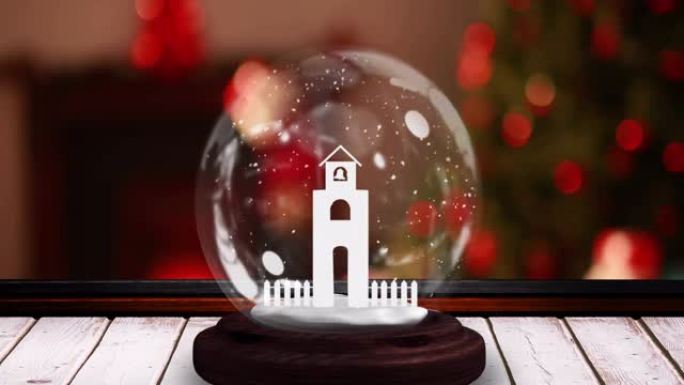 在闪烁的仙女灯上的木制表面上带有教堂塔的雪球动画