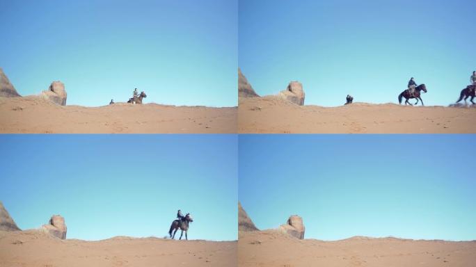 北美印第安人兄弟姐妹在亚利桑那沙漠上骑马