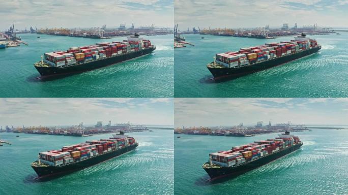鸟瞰集装箱货船全承运人集装箱前往码头商业港口进行商务物流，进出口，运输或货运。