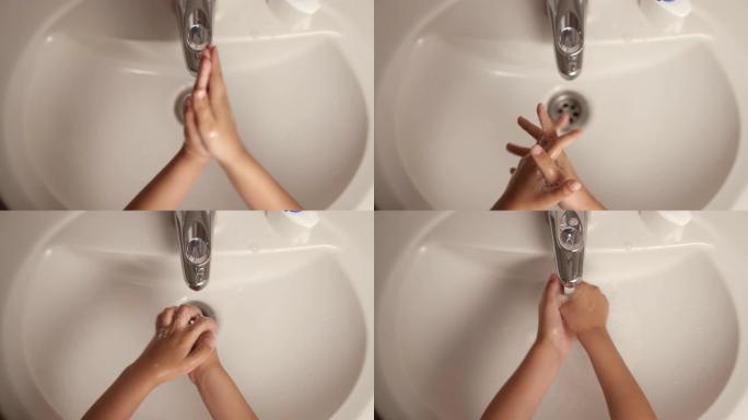 孩子用肥皂在白色水槽上洗手，以消除细菌并防止冠状病毒。个人卫生。洗手。男孩在检疫新型冠状病毒肺炎时洗