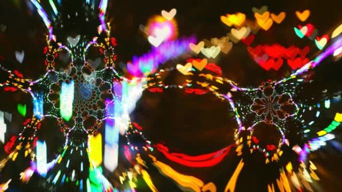抽象形状的心彩虹色滚动看起来像两个孔雀蜘蛛在网上镜子反射