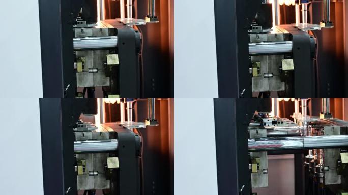 吹塑模具机生产pet瓶的4k镜头。