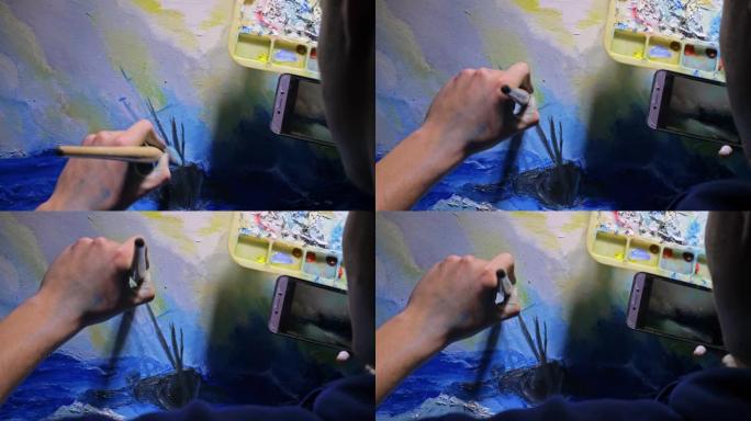 艺术家抄写员用海洋中的船绘制海景。工匠装饰师在蓝色的海上航行时画画。手机平板电脑。