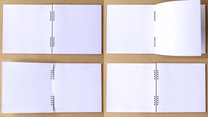 停止运动书动画打开白色空白页，用于在木制背景上书写。