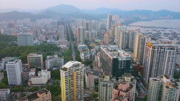 日落时间珠海市景交通街海湾港口空中全景4k中国