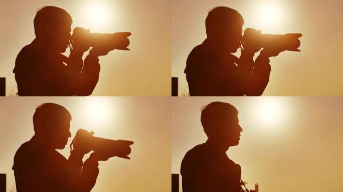摄影师在日落时拍照