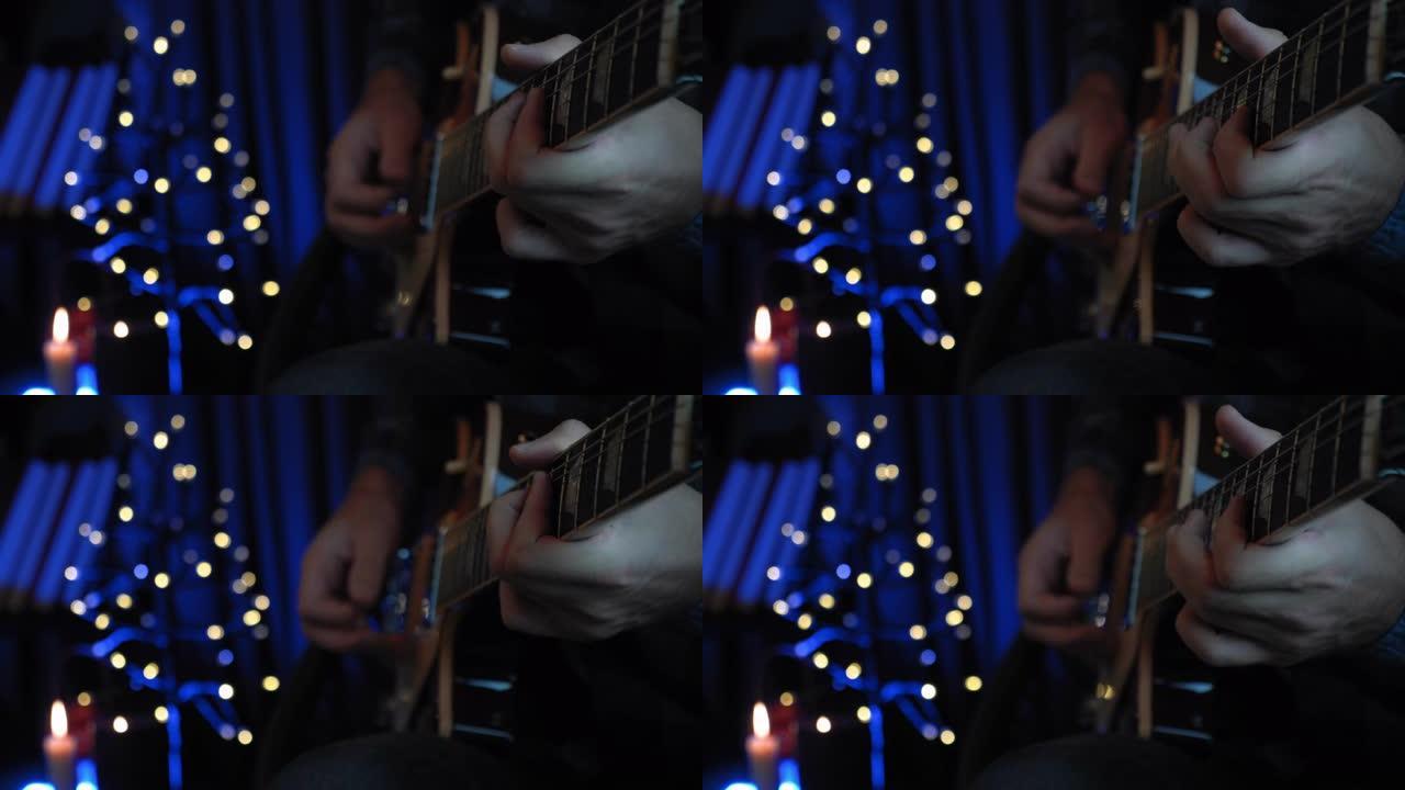 吉他手在现代黑暗录音人声工作室中以电吉他演奏独奏歌曲，背景为灯光。男人坐在房间里用吉他学习新和弦。音