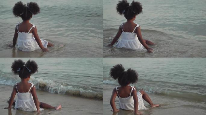 放松心情后视图非洲儿童在海滩上