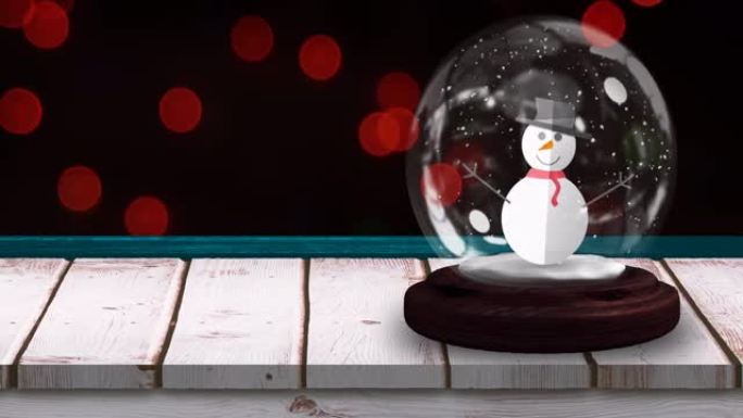 黑色背景上闪烁的圣诞红色仙女灯雪人雪球动画