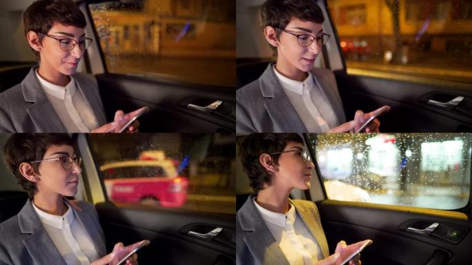 年轻的女商人在看着车窗时使用智能手机