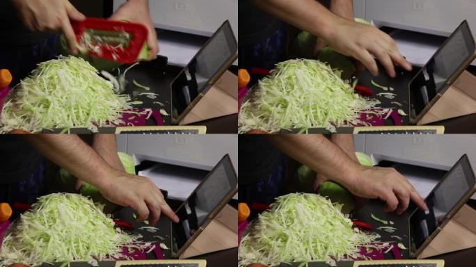 一个人切碎卷心菜。通过视频链接广播该过程。大流行期间在家泡菜。特写镜头。
